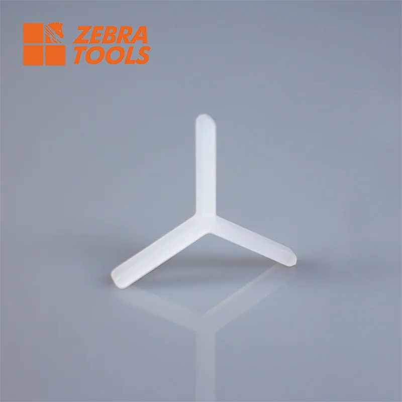 Y-shaped tile spacer — Y-leg design locks cross joints level in floor and wall tile
